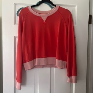 orange and pink light sweater